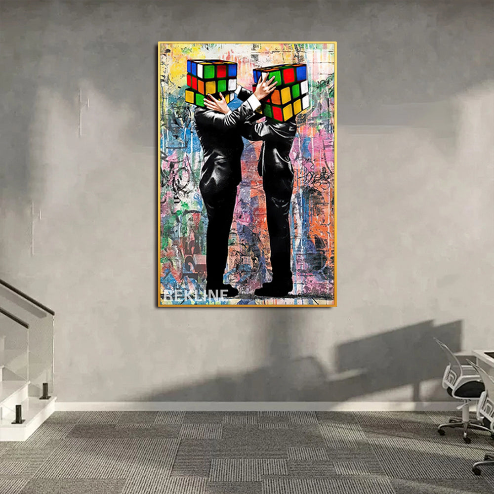 Two suited figures embracing with Rubik’s cube heads on a graffiti-style canvas, glowing LED backlight