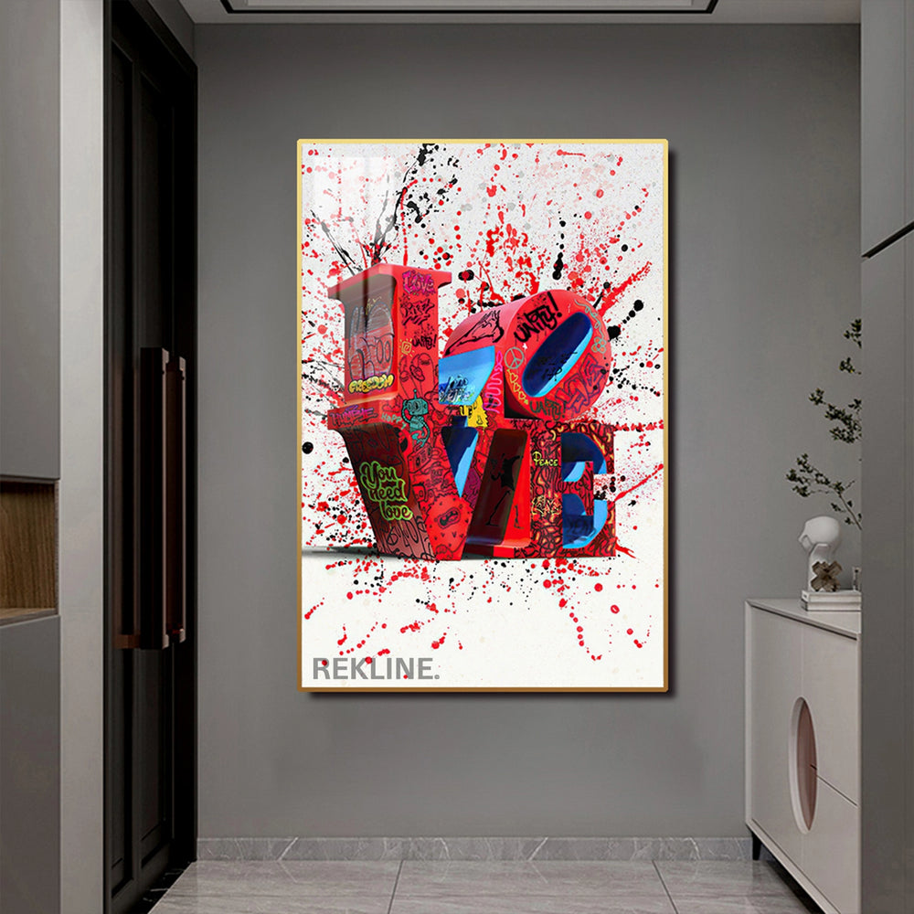 Red graffiti “LOVE” letters splattered with paint on a white background, backlit by LED strips in a sleek gold frame