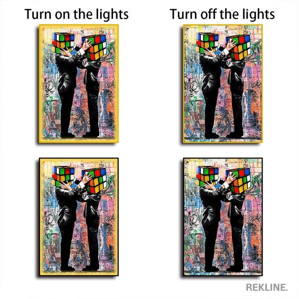 Rubik Cube Heads LED Canvas | 100×150 cm LED-Illuminated Crystal-Porcelain Rubik Cube Painting, Gold/Black Frame | By REKLINE