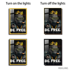 Be Free Gorilla Painting | Vertical LED Canvas 100×150 cm | LED-Illuminated Crystal Porcelain Canvas, Gold/Black Frame | By REKLINE