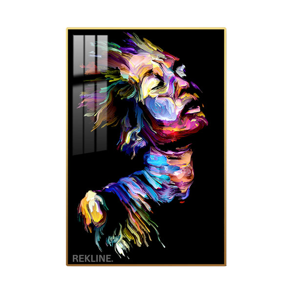 Abstract portrait of a woman’s face with multicolored brushstrokes on black canvas, softly illuminated by LEDs