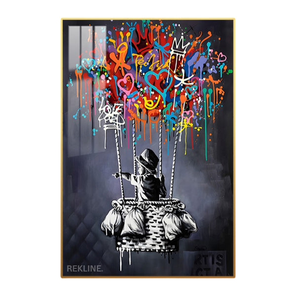 Child in a hot air balloon basket beneath a vibrant graffiti cloud, backlit by LED lighting