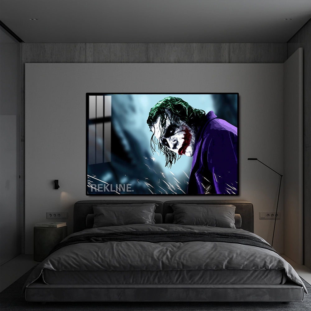 Close-up of Joker’s face with green hair, red smile, and purple coat on a dark background, backlit by LED strips