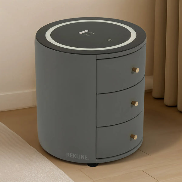 Gray 3-drawer bedside table with LED ring light, wireless charging pad, dual USB ports, and built-in Bluetooth speaker